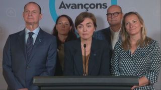 CAQ leader Christine Fréchette, centre, takes questions from the media on Friday, Oct. 2, 2026.