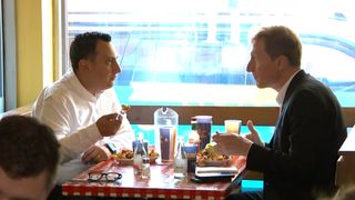 Glenn Micallef, European Commissioner for intergenerational fairness, youth, culture and sport (left) and Marc Miller, minister of Canadian identity and culture, enjoy a plate of poutine in Montreal on Oct. 29, 2026. CTV NEWS/Genevieve Beauchemin