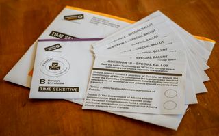 Alberta referendum mail-in special ballots are seen in Calgary, Thursday, Sept. 24, 2026.THE CANADIAN PRESS/Jeff McIntosh