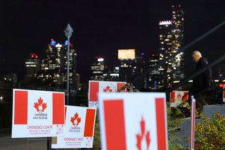 Forever Canadian signs seen outside of the pro Canada watch party in Edmonton, Monday, Oct. 19, 2026. THE CANADIAN PRESS/James Maclennan