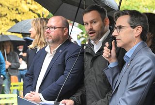 Parti Quebecois Leader Paul St-Pierre Plamondon speaks at a news conference flanked by local candidates, Chloe Fauchon, from the left, Claude Villeneuveand Pascal Paradis in Quebec City, Friday, Oct. 2, 2026.