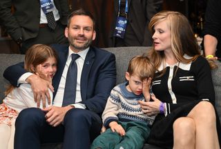 Parti Québécois Leader Paul St-Pierre Plamondon watches results come in alongside his spouse Alexandra Tremblay, and children Laurette and Henri in Montreal, Monday, Oct. 5, 2026.