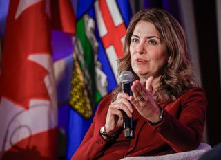 Alberta Premier Danielle Smith speaks at the Canada Strong and Free conference in Calgary, Friday, Oct. 16, 2026. THE CANADIAN PRESS/Jeff McIntosh