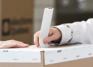 A person votes on election day in Montreal, Monday, Oct. 5, 2026.